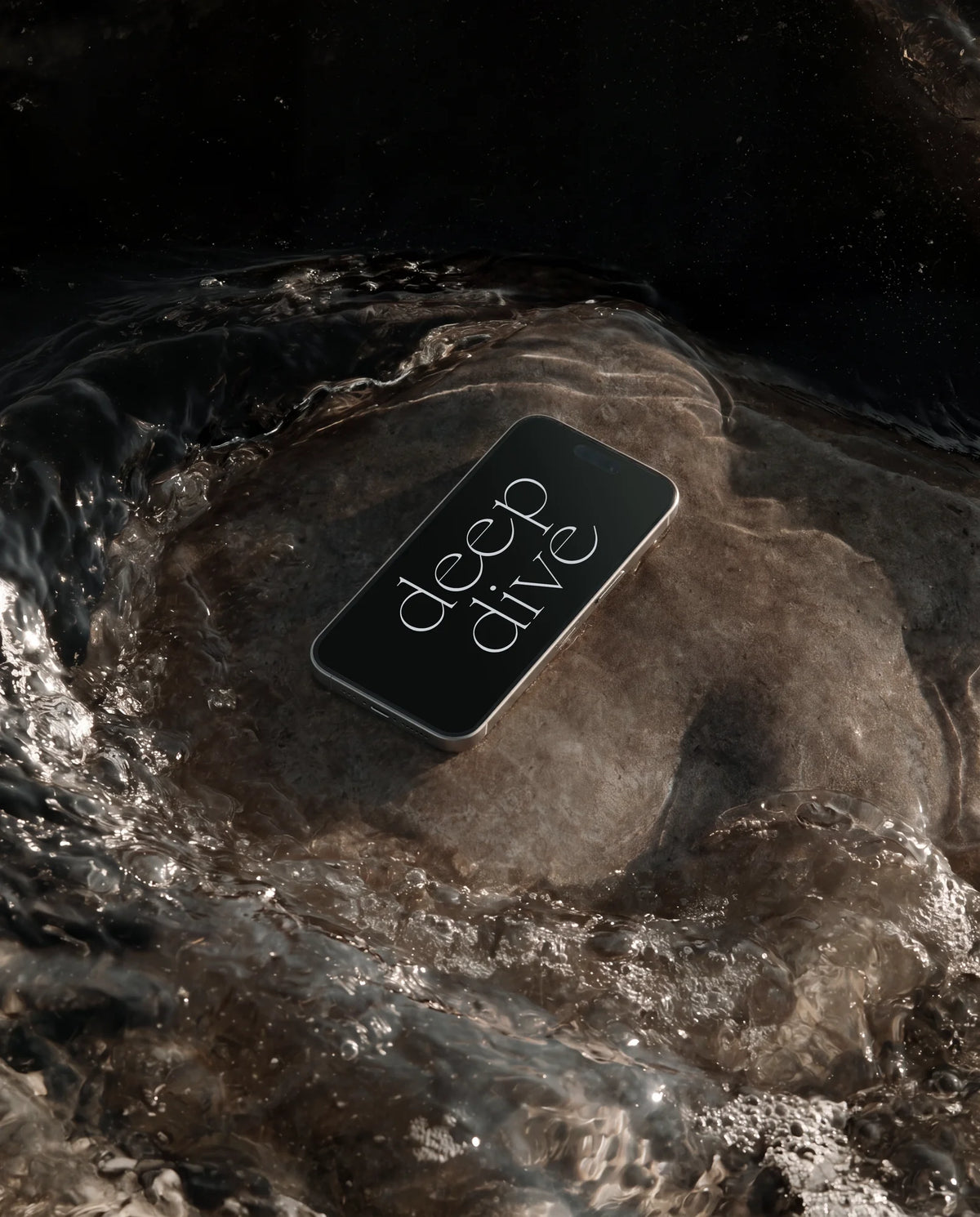 Smartphone displaying a Deep Dive typographic layout in Chiffon, surrounded by dark moving water.