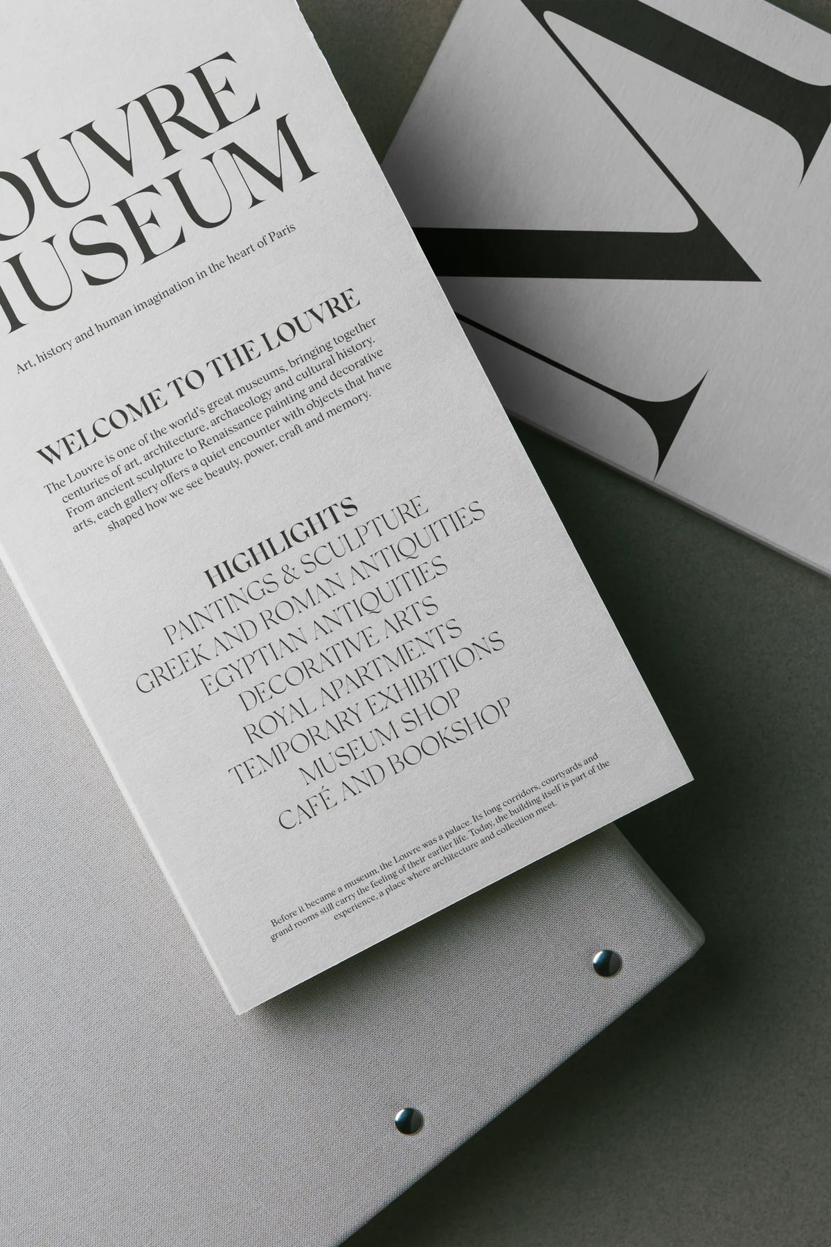Silk Serif used in a museum-style editorial brochure with large serif headlines and supporting text.