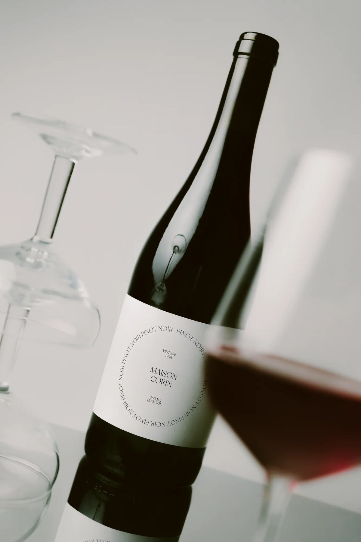 Silk Serif font used on a minimalist Pinot Noir wine label with elegant serif typography.