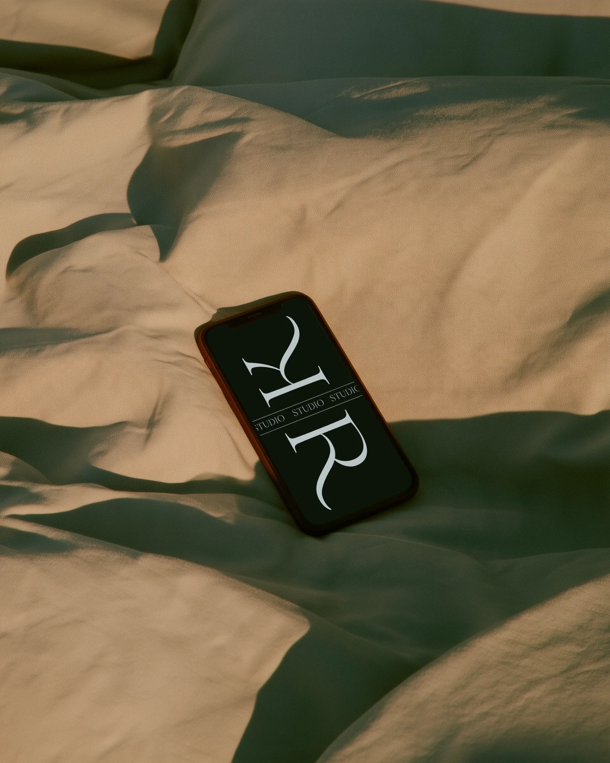 Velour serif font used on a phone screen displaying a minimal editorial design.