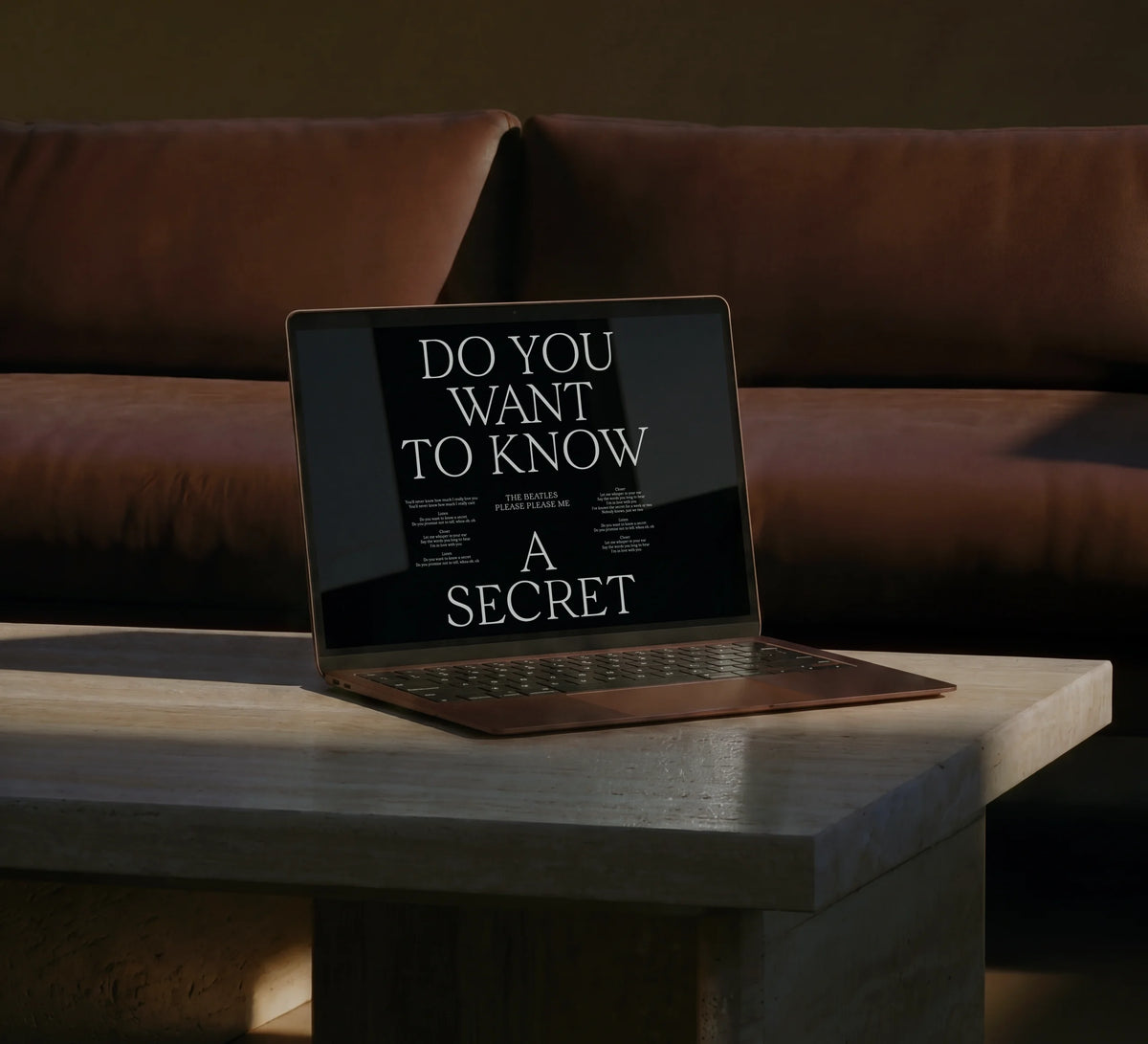 Laptop displaying a dark editorial layout with large Velour Raw typography reading “Do you want to know a secret.”
